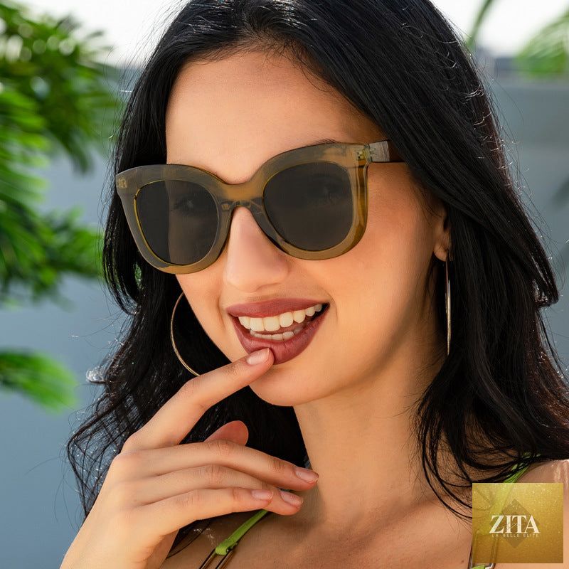 Large rim sunglasses for women by FitiqueFit featuring oversized fashion eyewear with bold, stylish frames and dark tinted lenses.