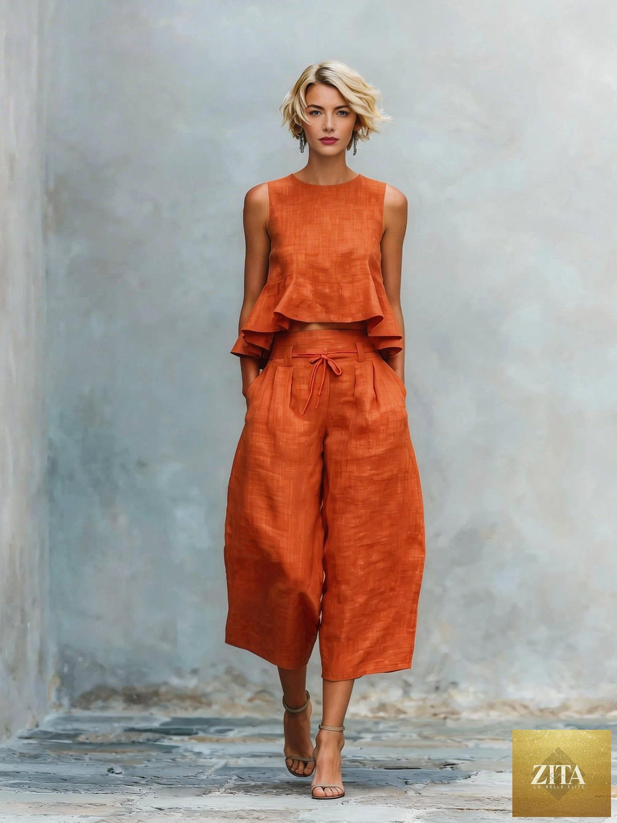 Women’s linen-blend sleeveless two-piece casualwear set with ruffled detailing by Zita La Belle Elite, shown on a model.