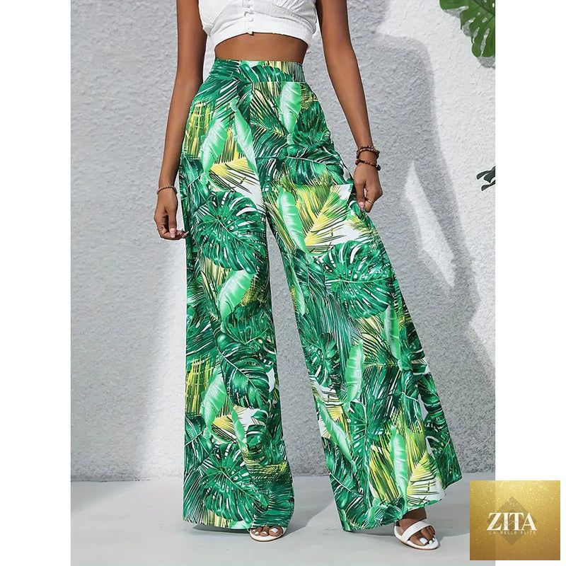 Women’s printed high-waist wide-leg palazzo pants from FitiqueFit, casualwear style with vibrant floral pattern and relaxed fit.