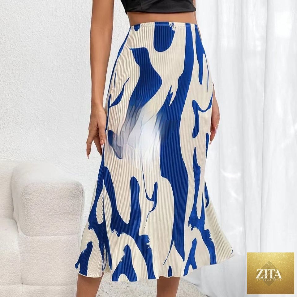 Women's zebra print pleated skirt with irregular hem and side slit, casualwear from Zita La Belle Elite.