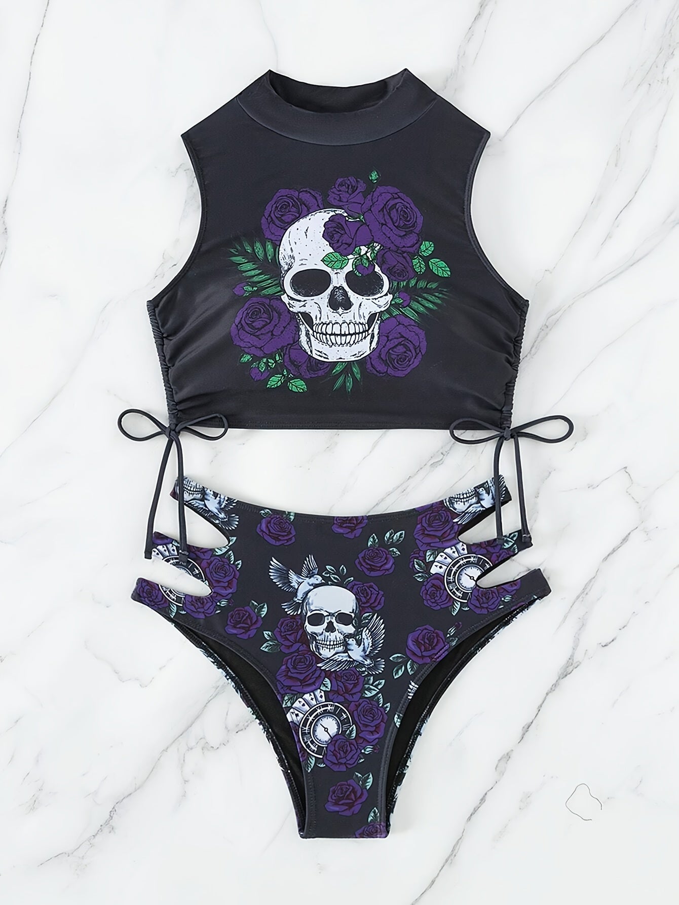 Stevvex skull print hollow-out bikini set with floral tie and lace-up details, perfect for beach, summer, and festival wear.