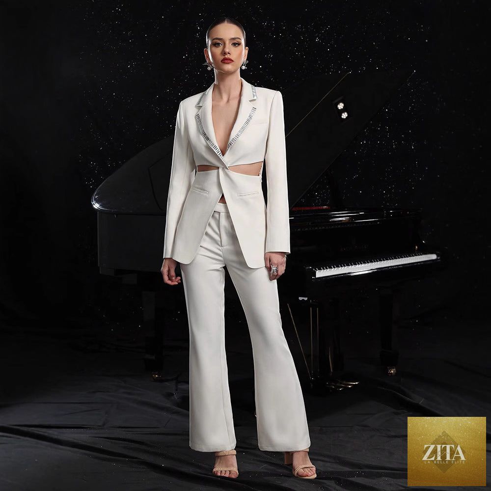 Elegant women's hollow-out long-sleeve suit jacket and pants set by FitiqueFit, featuring stylish cut-outs and tailored fit.