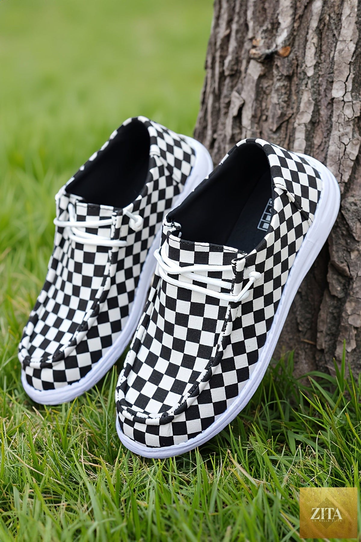 Black checkered print lace-up flat shoes for women with stylish design, perfect for casual wear from Wild and Free Boutique.