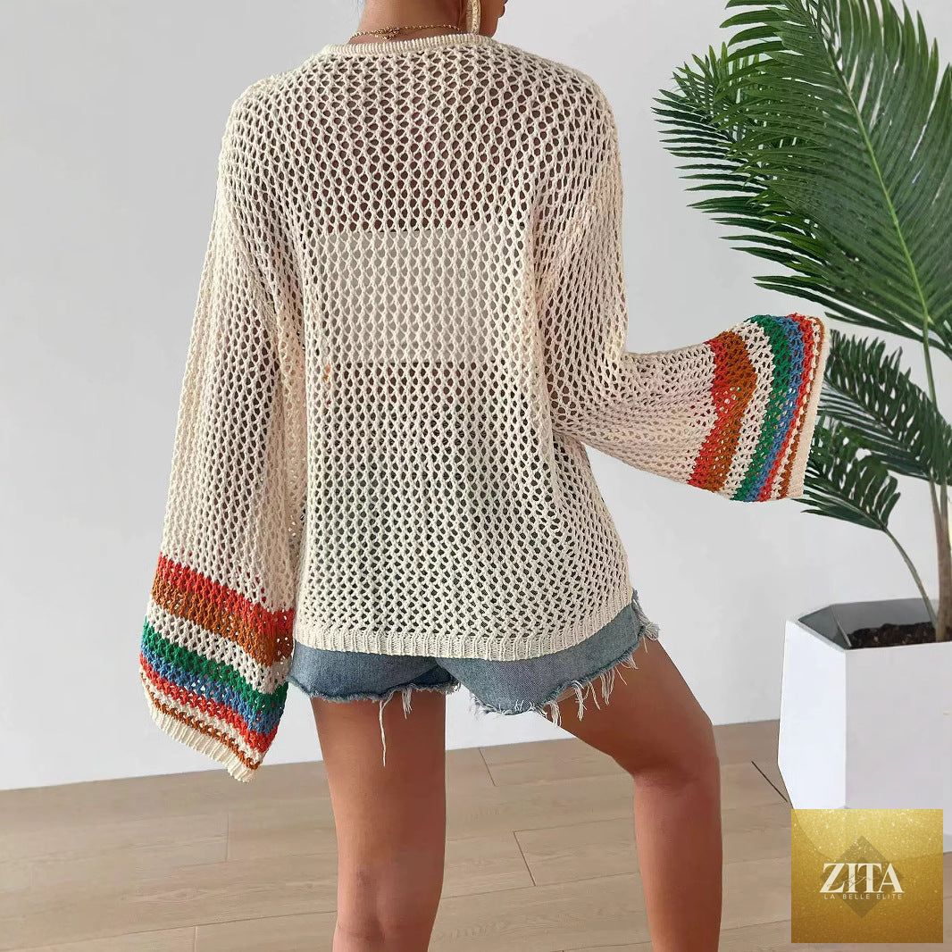 Hand-crocheted floral cardigan sweater by FitiqueFit, featuring an open front boho knit top with colorful floral patterns.