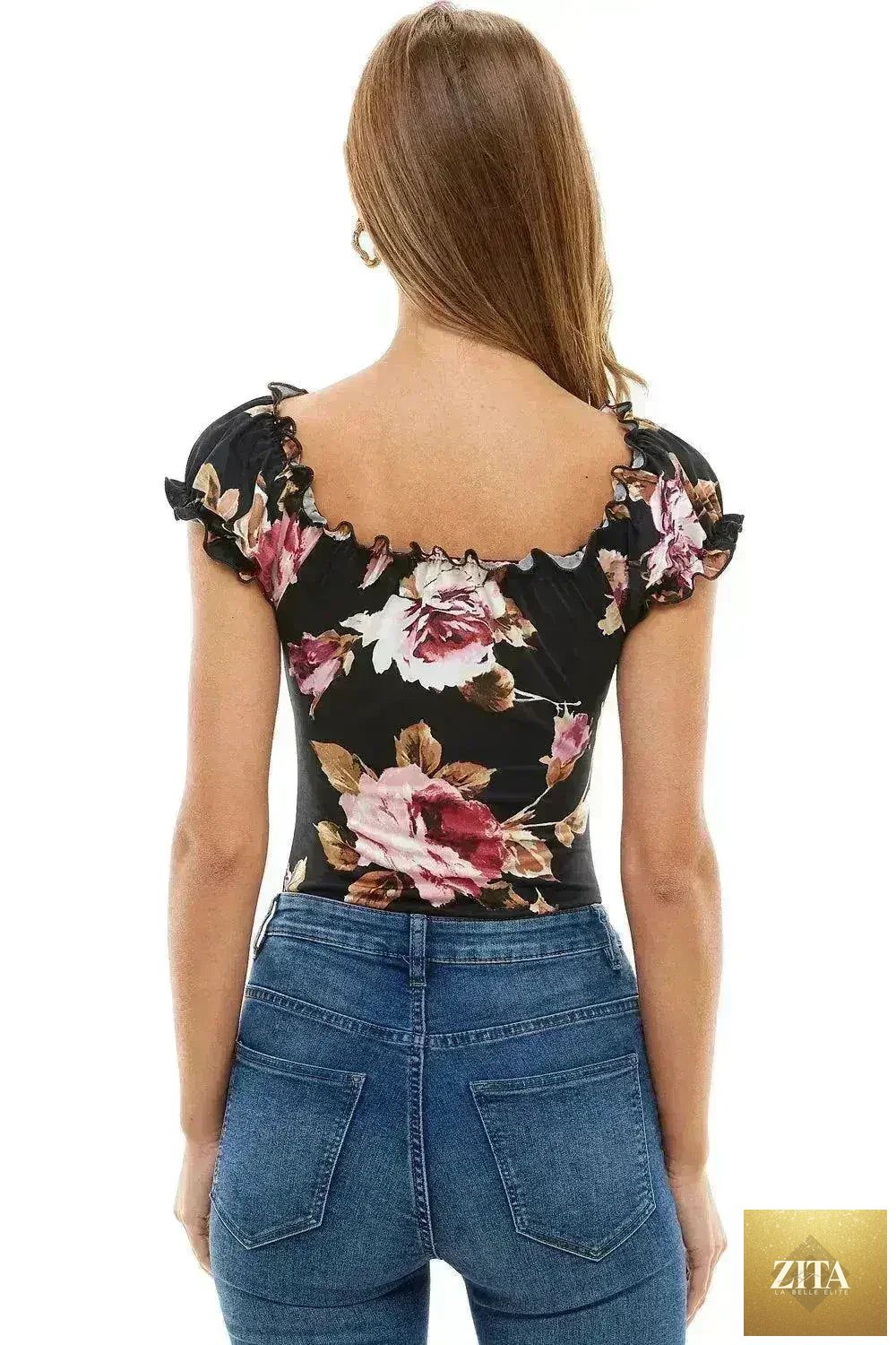 Femstylo floral print peasant puff sleeve bodysuit with ruffled neckline and fitted design, displayed on a hanger.