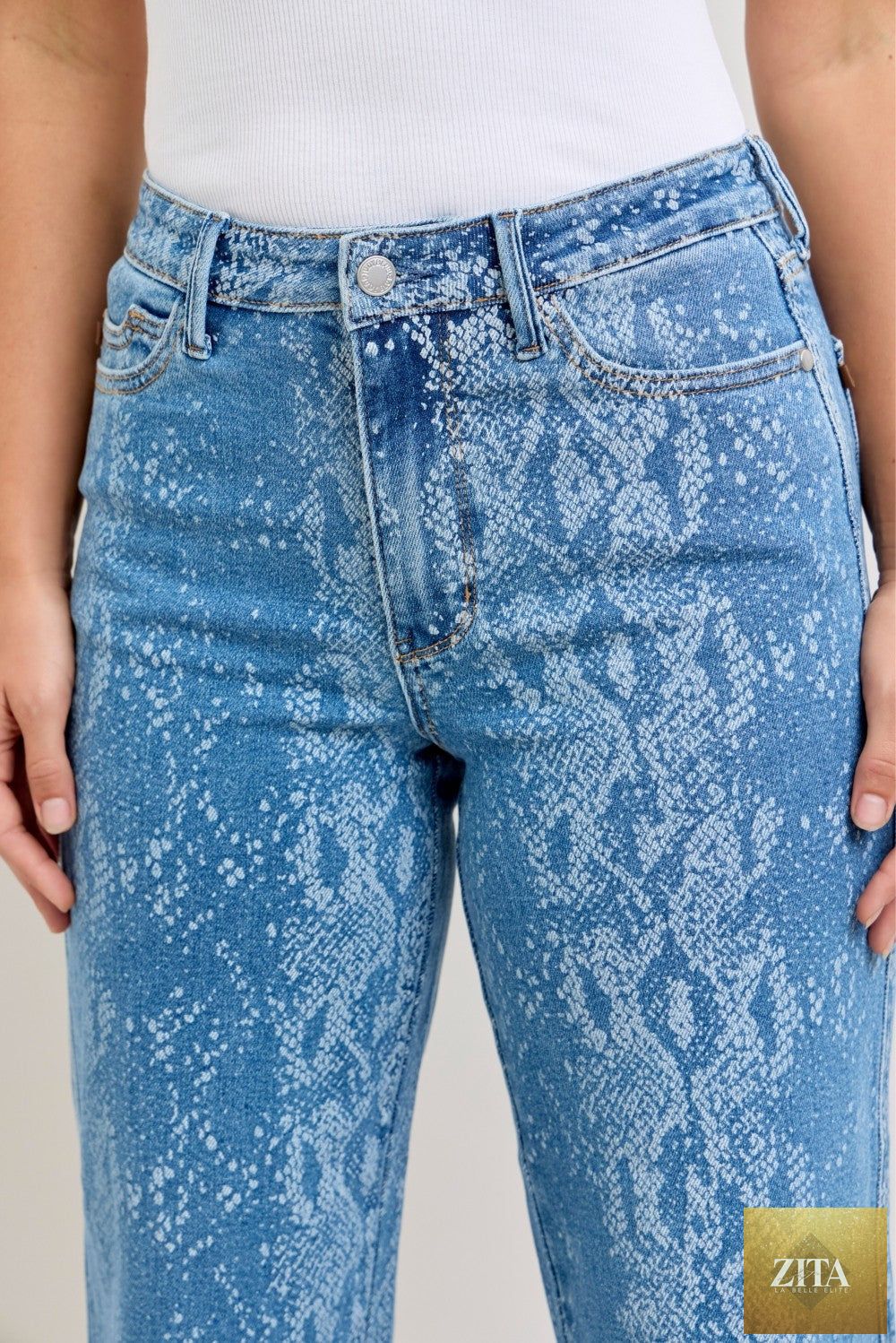 Wild and Free Boutique Judy Blue high rise ankle wide leg jeans, showcasing the stylish denim with a fitted waist and wide ankle cuffs.