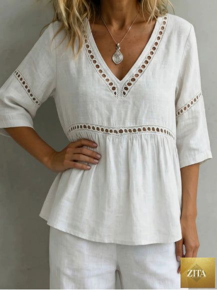Women’s V-neck hollow-out fringe cotton-linen top by Zita La Belle Elite, casualwear, showing detailed neckline and fringe accents.