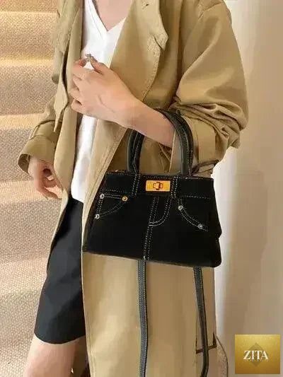 Femstylo stylish suede handbag with adjustable strap and dual-use design, showcasing a modern, versatile bag for everyday use.