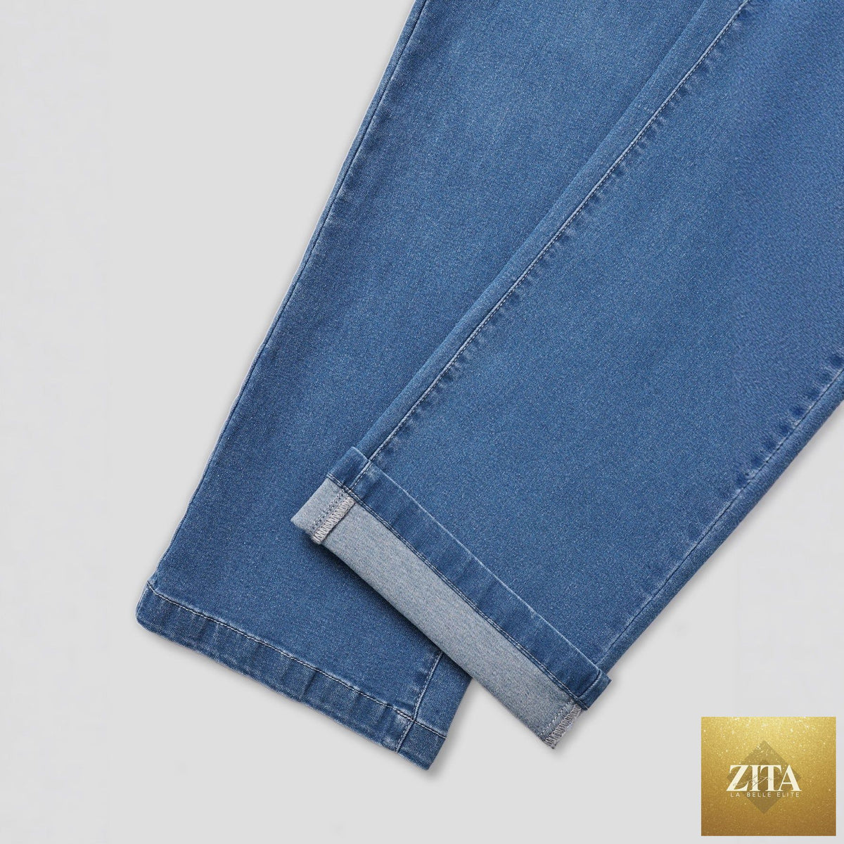 Stylish stretchy slimming pants for women, featuring a modern fit and comfortable fabric, shown on a model.