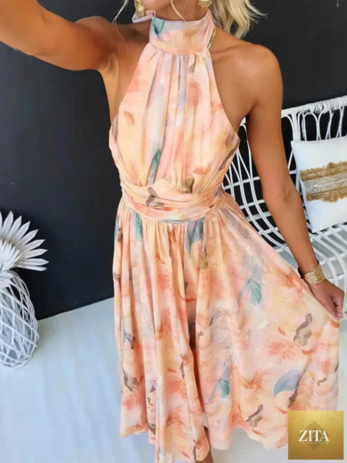 Floral halter neck backless summer dress by Shopiebay, featuring vibrant flower patterns and lightweight fabric.