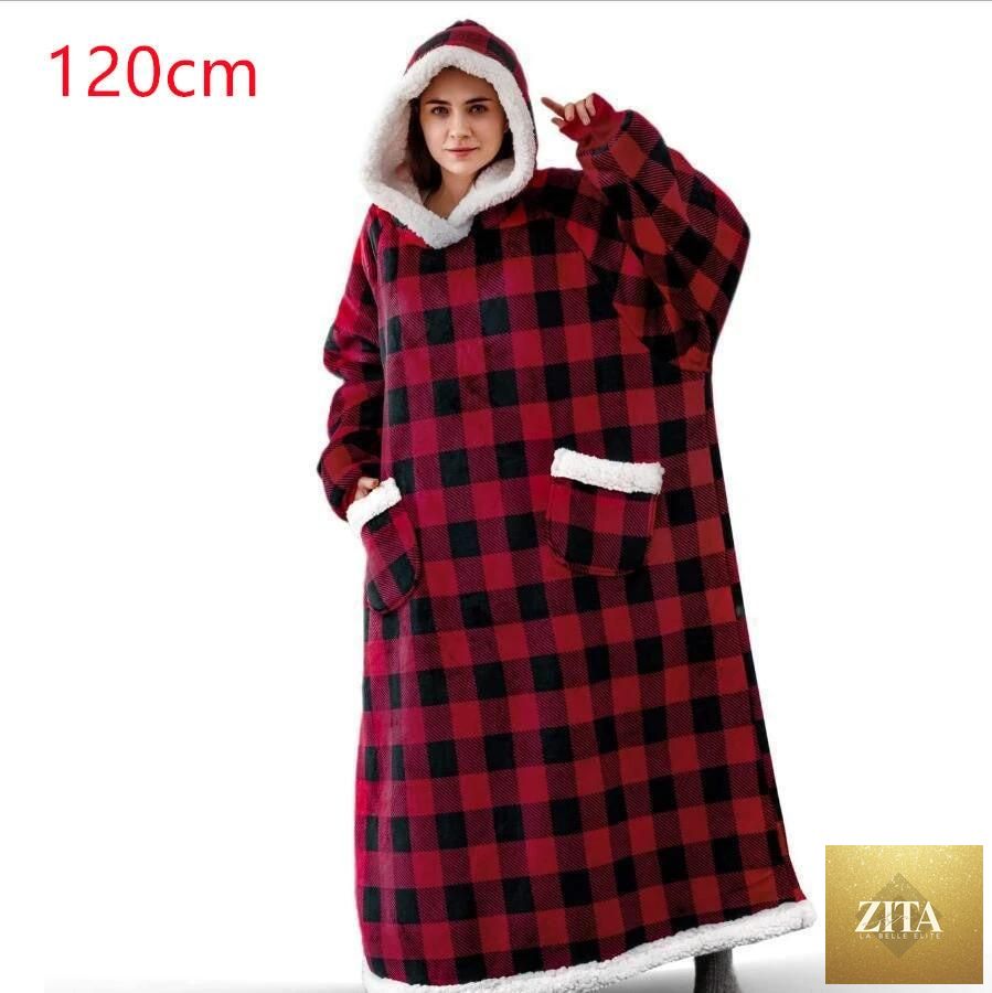Mandotos winter TV hoodie blanket worn by woman, oversized warm pullover with pockets for cozy home comfort.