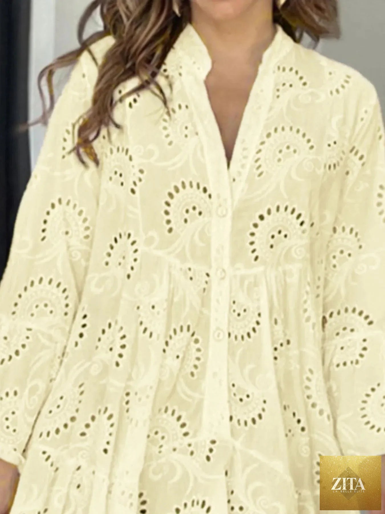Eyelet ruffled hem tiered dress by Shopiebay featuring a feminine design with layered fabric and eyelet details.