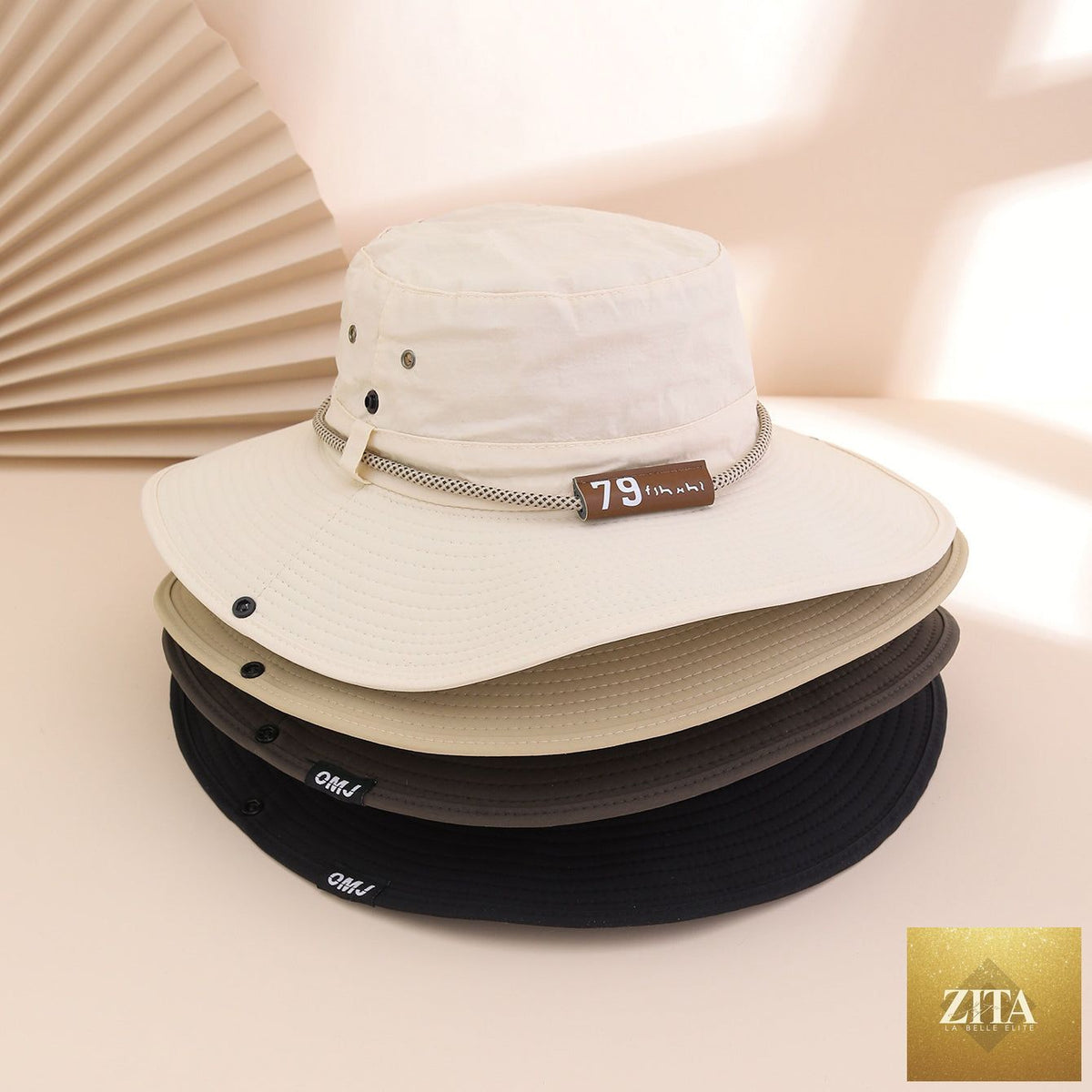 Wide-brim leather patch fisherman hat by Zita La Belle Elite with UV sun protection, outdoor hat for sun shading and style.