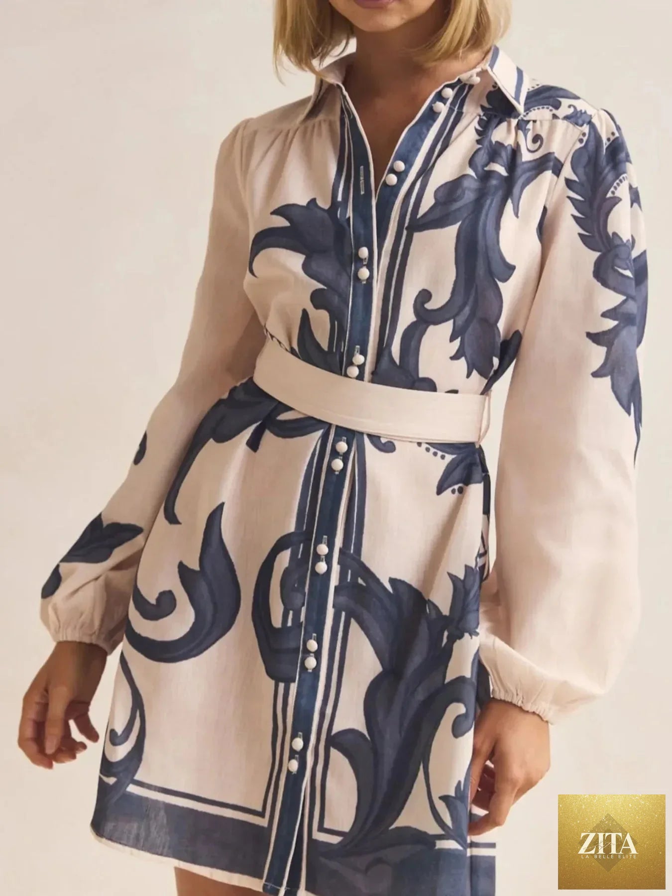 Printed long sleeve shirt dress from Shopiebay featuring a casual, flowy design with a button-up front and collar.