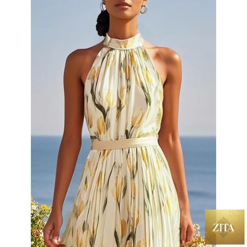 Women's floral and solid print halterneck high-waist swing dress by FitiqueFit, featuring a casual, flowing design.