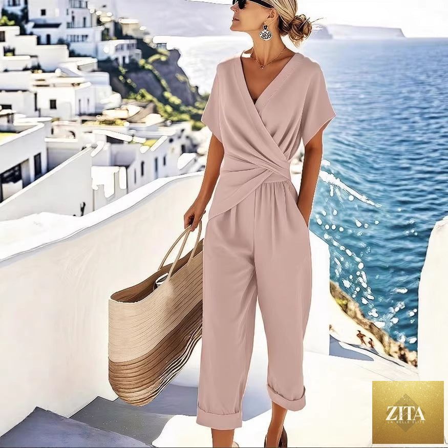Women's loose irregular short-sleeve two-piece casualwear set by Zita La Belle Elite, featuring a relaxed fit top and matching shorts.