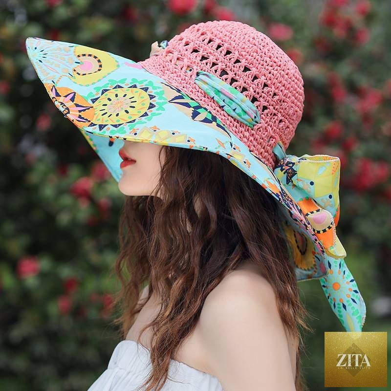 Women's patterned straw beach sun hat with round crown, UV protection, perfect for summer; by Zita La Belle Elite.