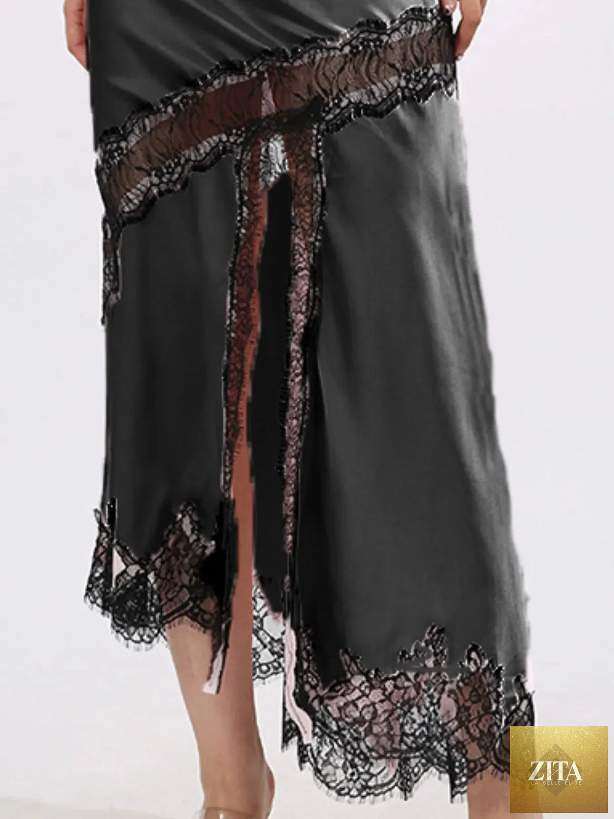 Zita La Belle Elite lace trim asymmetrical midi skirt showing delicate lace details and flowing, uneven hemline.