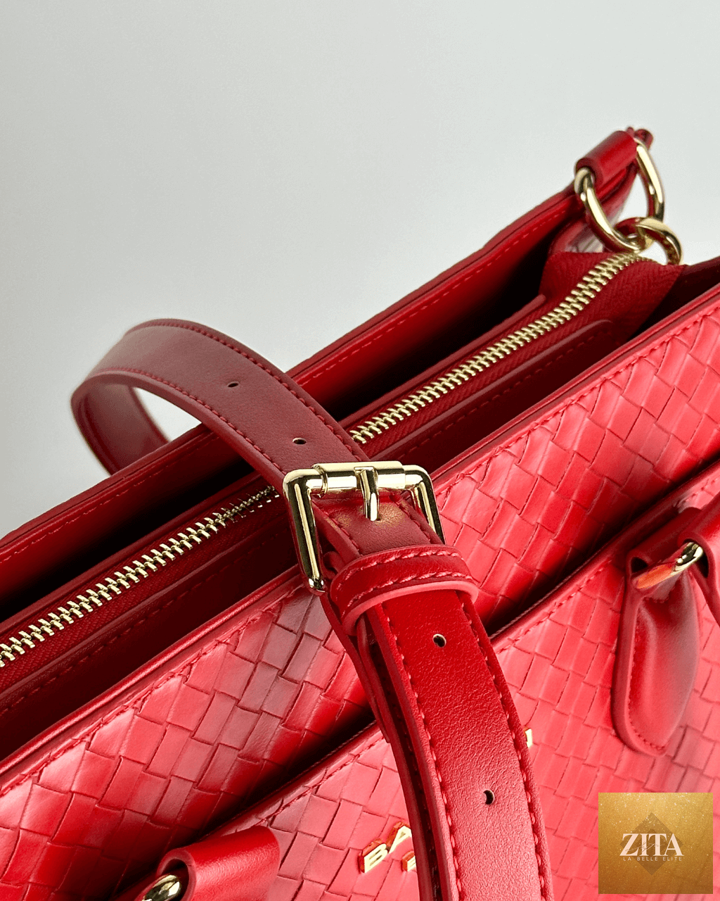 Baldwin Baby Company Montrose Diaper Bag Tote in Cardinal red with adjustable straps and spacious interior for baby essentials.