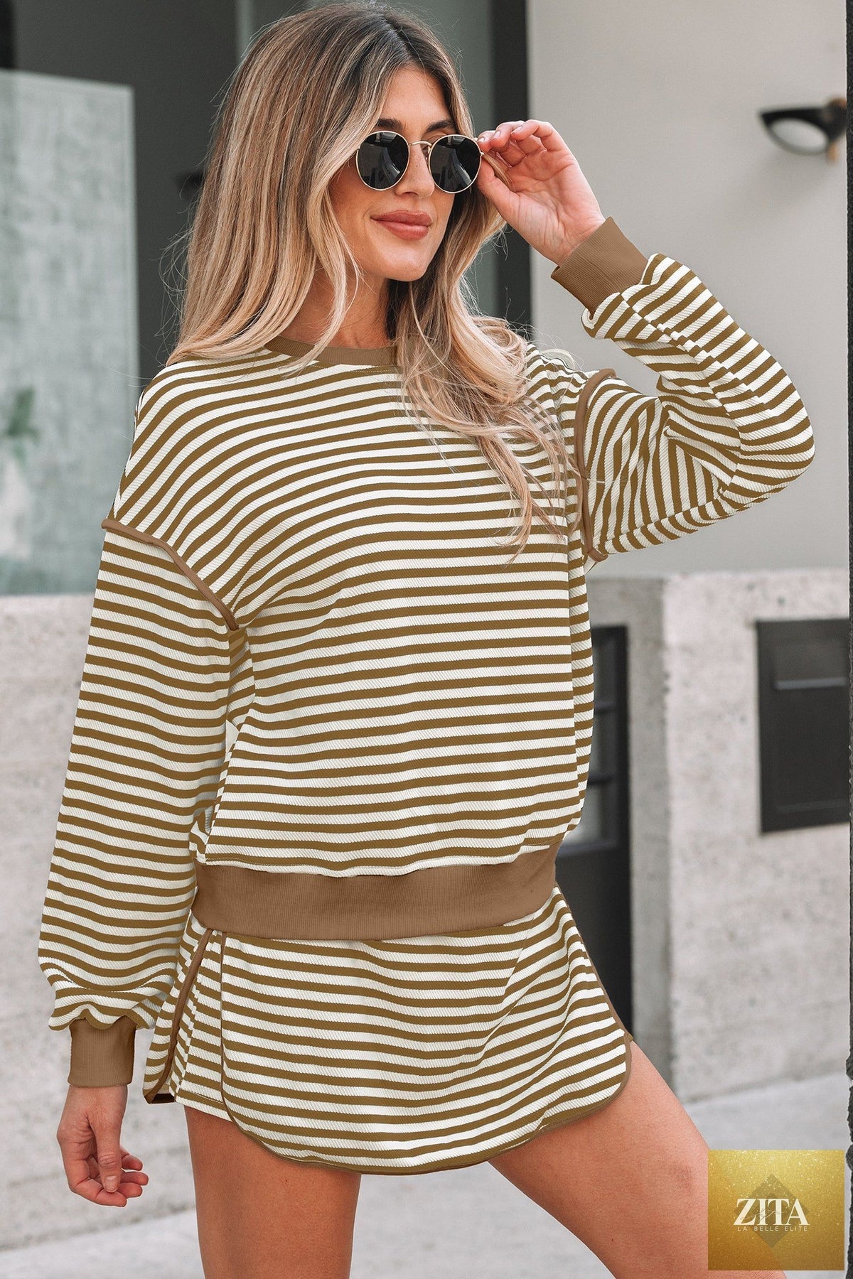 Black stripe textured drop shoulder pullover top and drawstring mini skirt two-piece dress set by Wild and Free Boutique