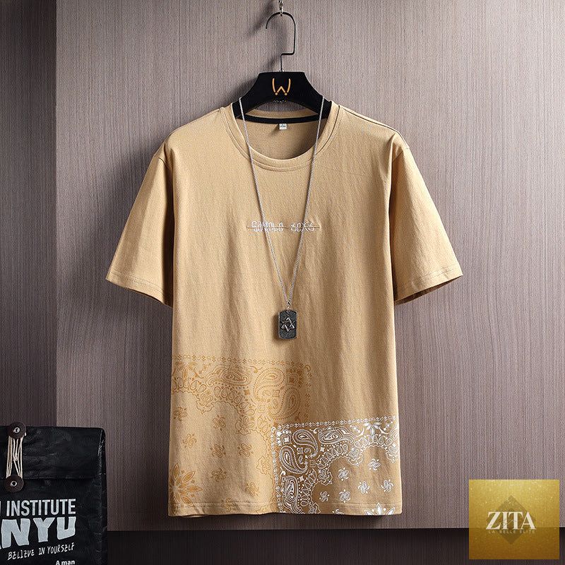 Short-sleeved Zita La Belle Elite casual T-shirt displayed on a hanger with a simple background.