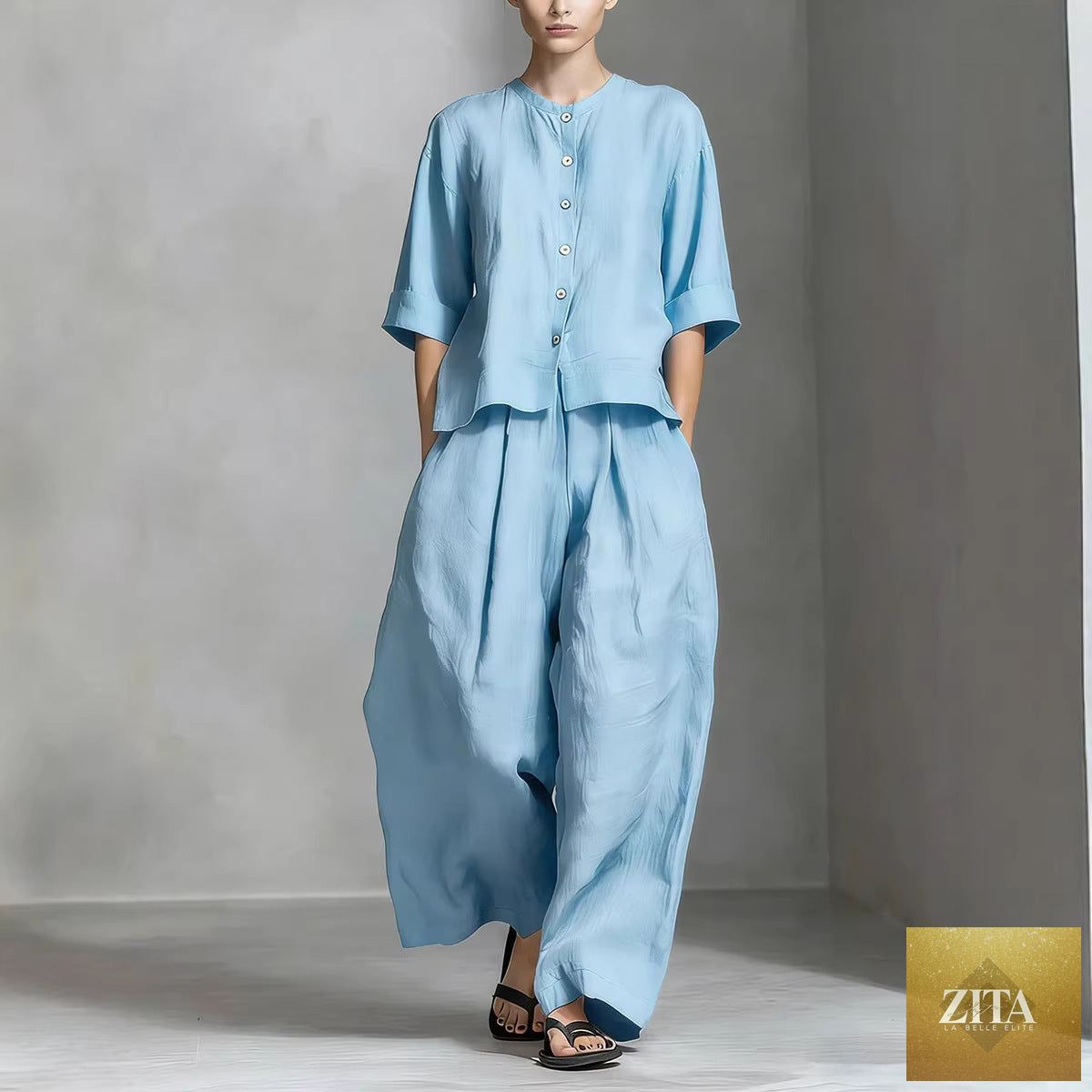 FitiqueFit three-quarter sleeve shirt and loose trousers two-piece set, casual and comfortable clothing for women.