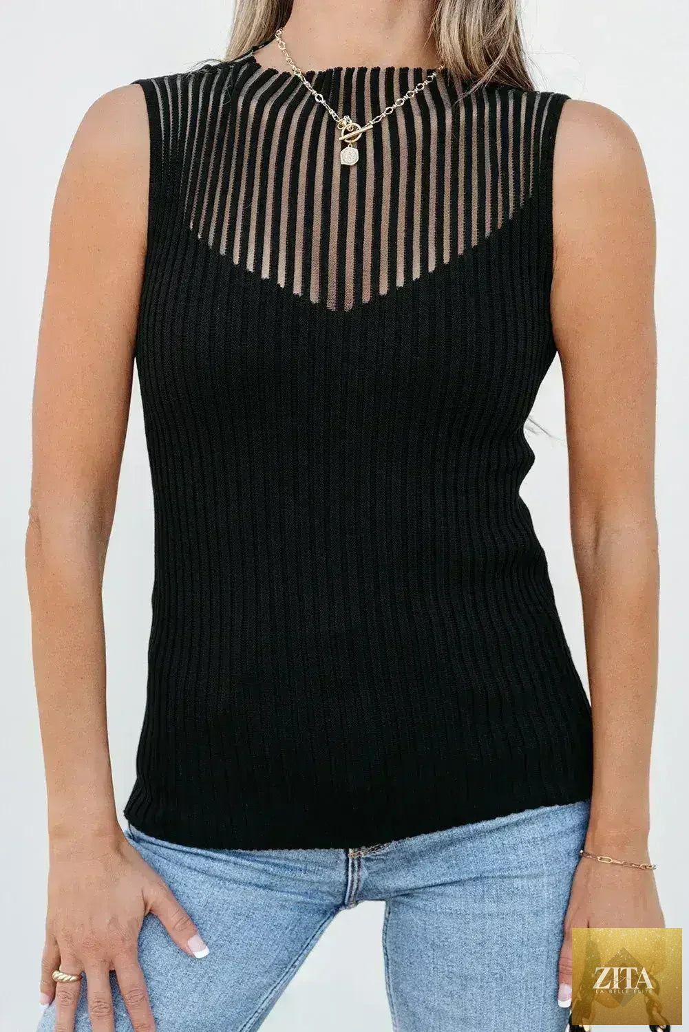 Black mesh cutout knit vest by Femstylo featuring edgy ribbed design, perfect for stylish tops and blouses.