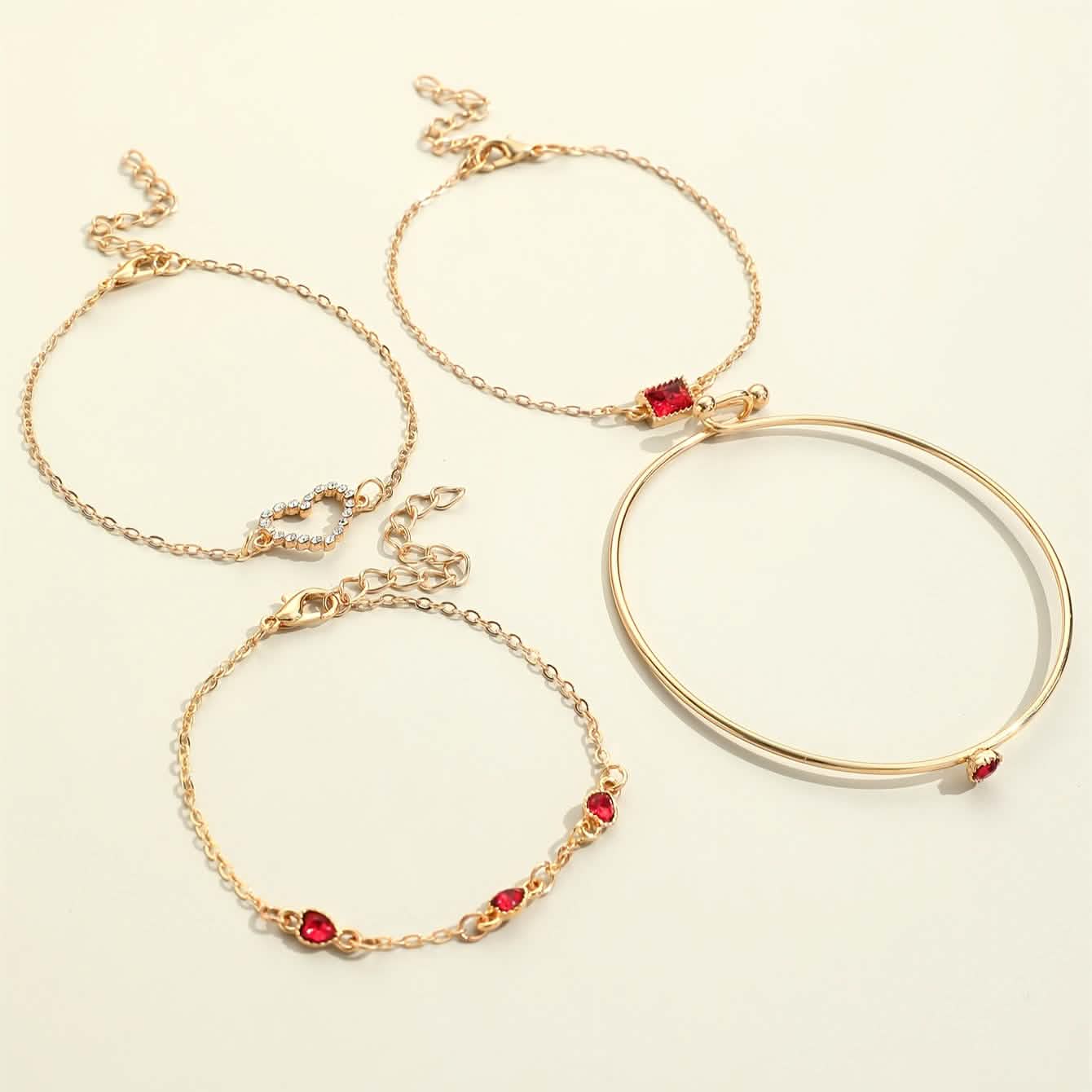 Set of 4 rhinestone alloy bracelets with minimalist heart and square designs, perfect for stylish jewelry accessories.
