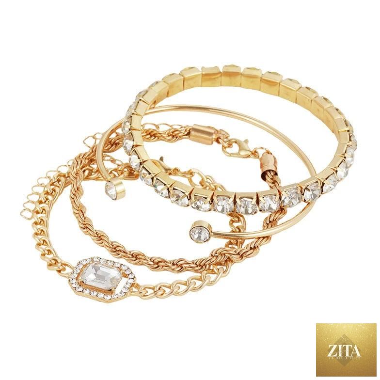 Set of four bohemian-style crystal bracelets featuring twisted cuffs and vintage luxury design, perfect for women’s fashion jewelry.