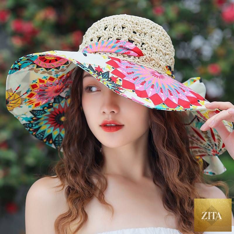 Women's patterned straw sun hat with round crown, UV protection, perfect for summer, by Zita La Belle Elite.