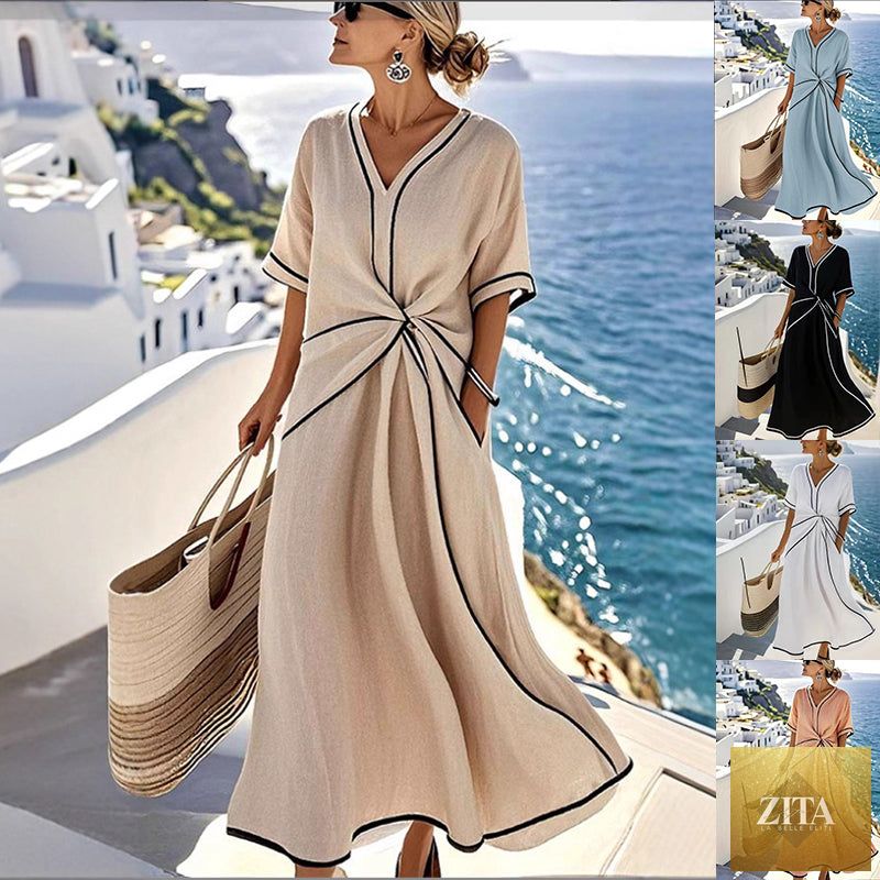 Striped print maxi dress by FitiqueFit featuring short sleeves, perfect for beach vacations and summer outings.