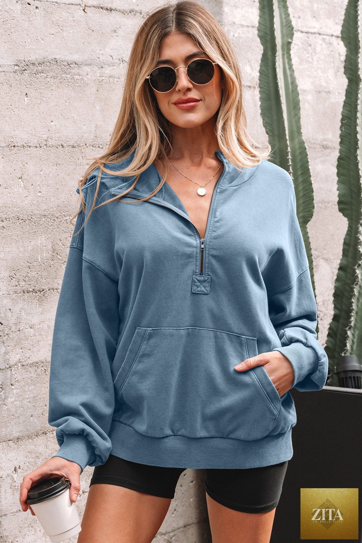Black half-zip kangaroo pocket mineral wash hoodie from Wild and Free Boutique, baggy fit, casual sweatshirt with hood.