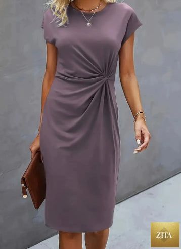 FitiqueFit front knot sleeveless midi dress with round neck, bodycon fit, and tie detail, perfect for stylish casual or evening wear.