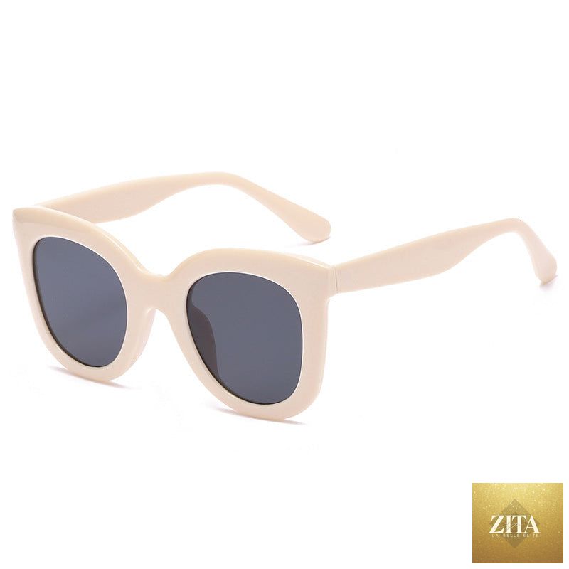 Large rim sunglasses by FitiqueFit, oversized women's fashion shades with bold black frames and dark tinted lenses.