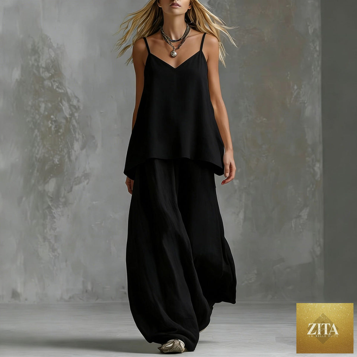 Women's sleeveless off-shoulder elegant pantsuit set by FitiqueFit, featuring a stylish two-piece casualwear with tailored fit and modern design.