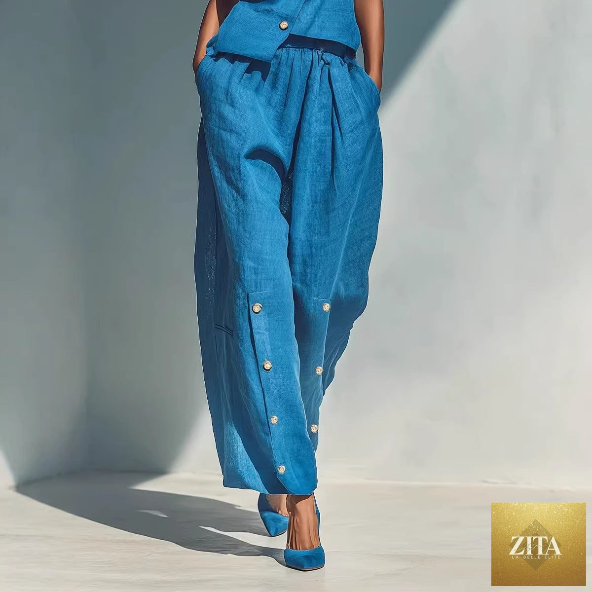Women's gold-buckle camisole and pants two-piece casualwear set by Zita La Belle Elite, featuring stylish gold accents and comfortable fit.
