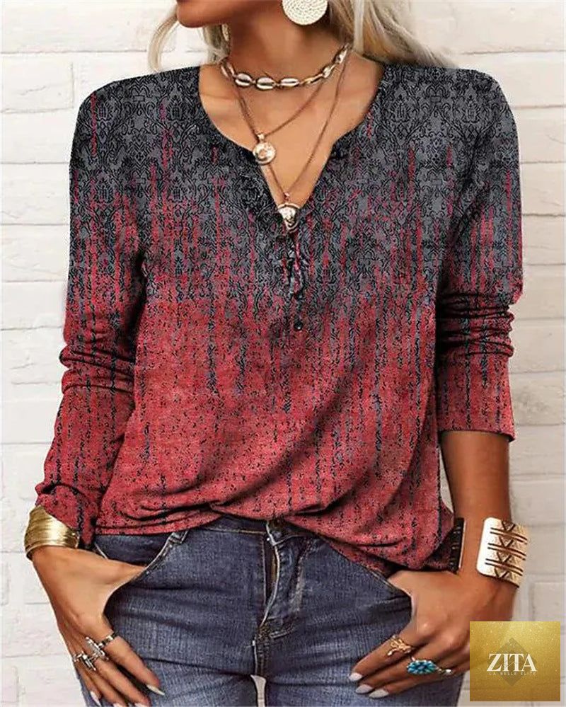 Women's ethnic print V-neck long sleeve loose casual T-shirt by Zita La Belle Elite, featuring vibrant traditional patterns.