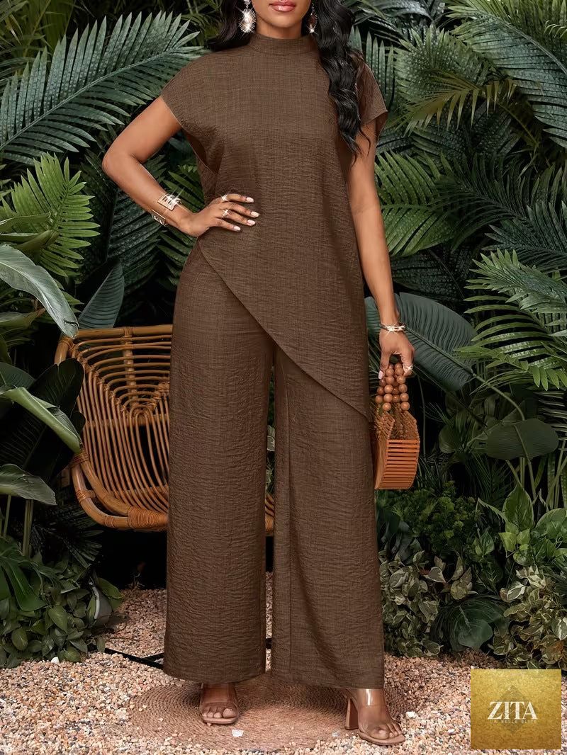 Asymmetrical sleeveless top and pants set by FitiqueFit, stylish women's two-piece outfit with modern design and comfortable fit.
