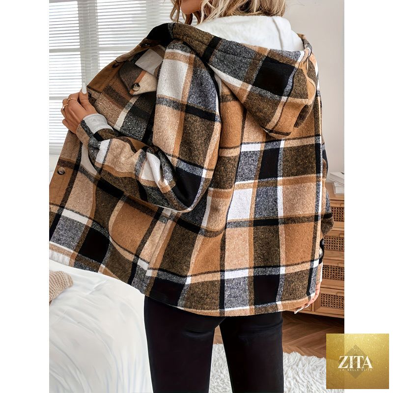 Women's plaid fleece-lined hooded jacket by FitiqueFit, showing the cozy plaid pattern and attached hood on the jacket.