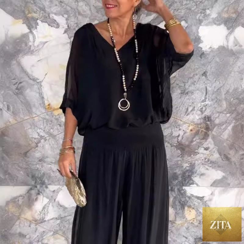 Solid-color chiffon two-piece casualwear set by FitiqueFit, available in 10 colors, featuring a relaxed fit for comfortable style.