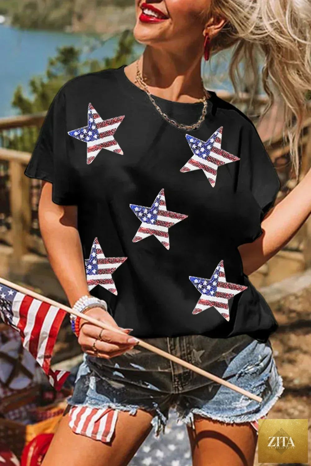 Black sequined American flag star graphic T-shirt from Femstylo, featuring bold star and flag design on soft fabric.