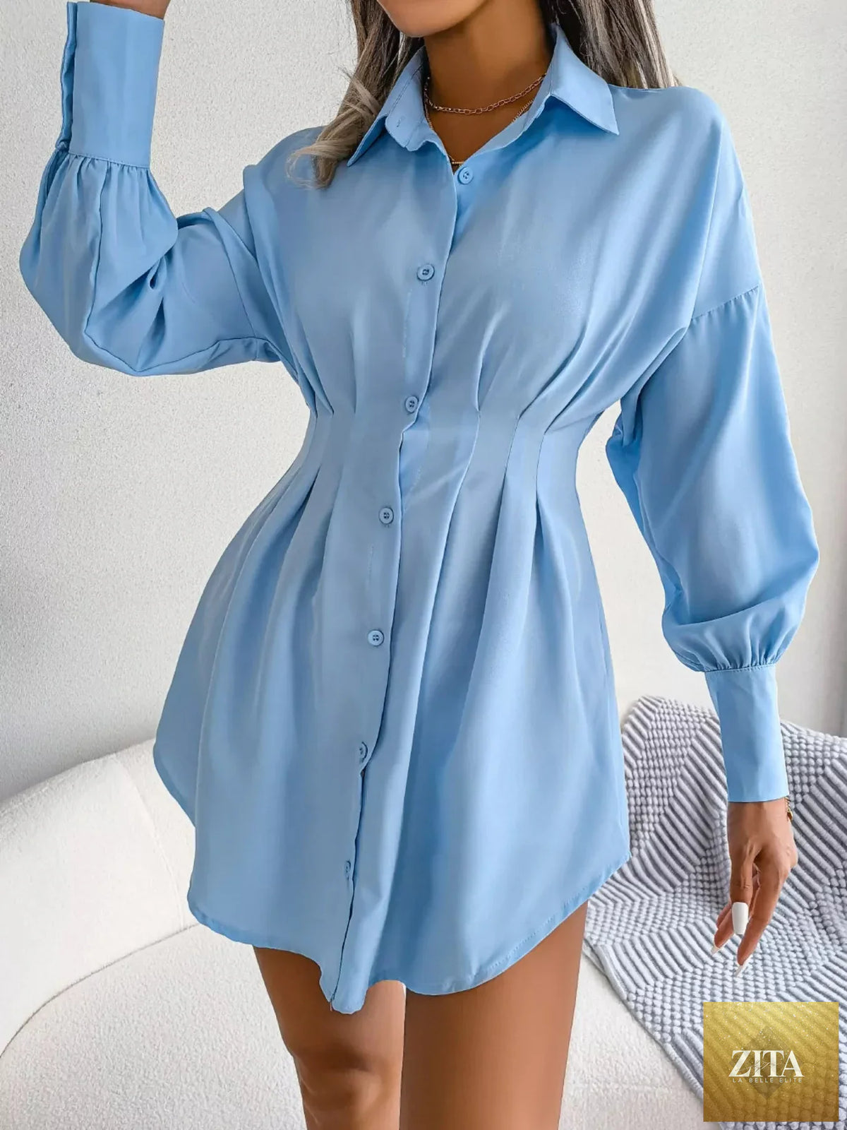 Elegant Shopimist button-down mini shirt dress with cinched waist, featuring long sleeves and a stylish collar.