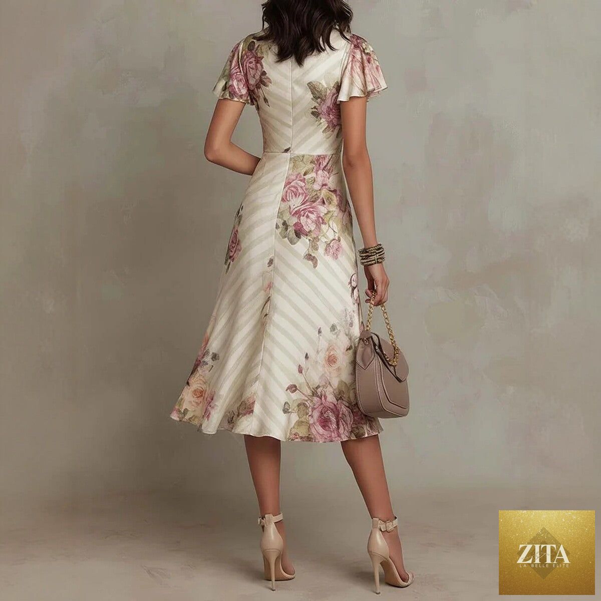 Zita La Belle Elite satin maxi dress with ruffled hem, V-neck, and color block design, featuring an A-line silhouette.