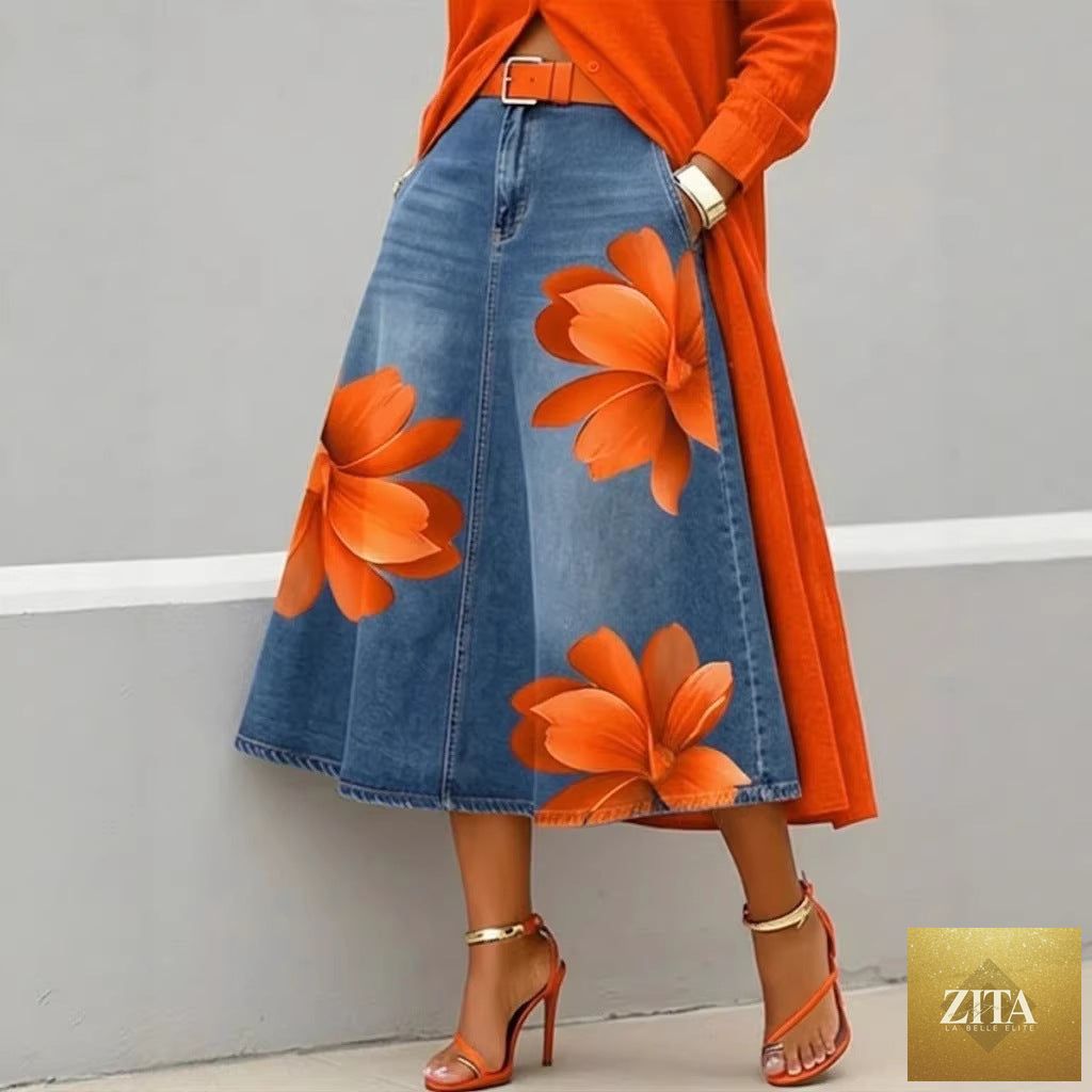 Women's floral print denim-style A-line midi skirt by FitiqueFit, featuring a boho-inspired design and flowing silhouette.