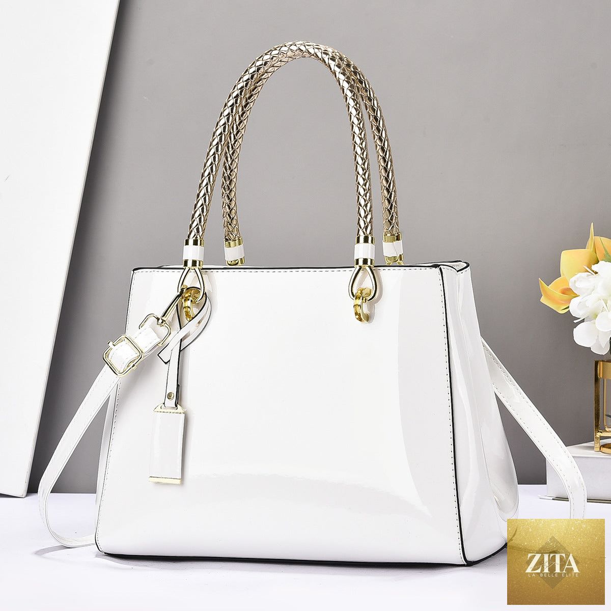 Elegant genuine leather handbag with glossy patent leather finish, large capacity casual shoulder crossbody bag.