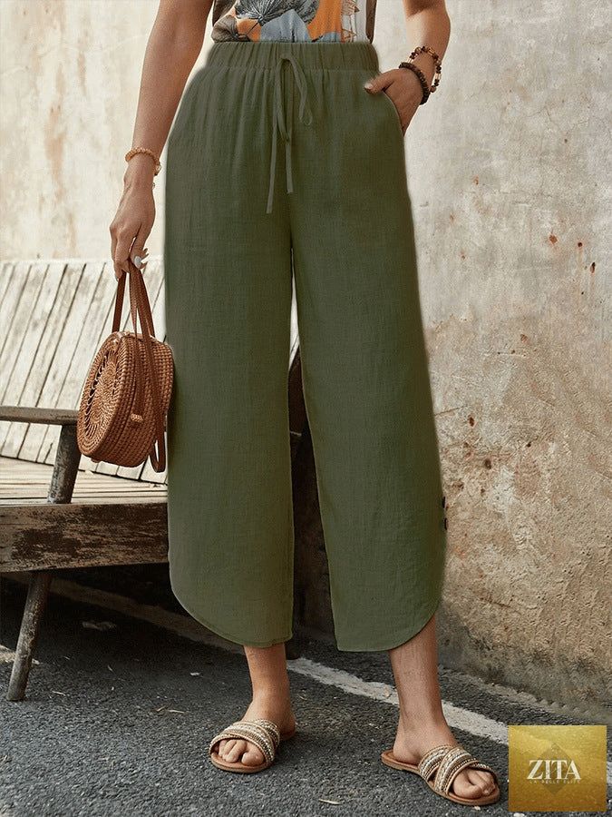 Women's cotton-linen cropped drawstring pants by FitiqueFit, casualwear with a relaxed fit and adjustable waist.