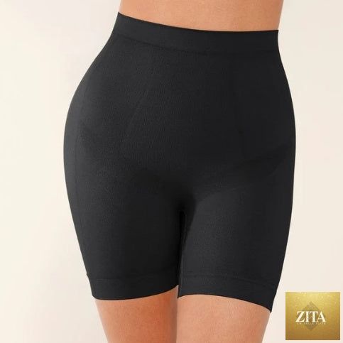 Seamless form-fitting mid-rise tummy control shorts in black, designed to shape and smooth the waist and hips.