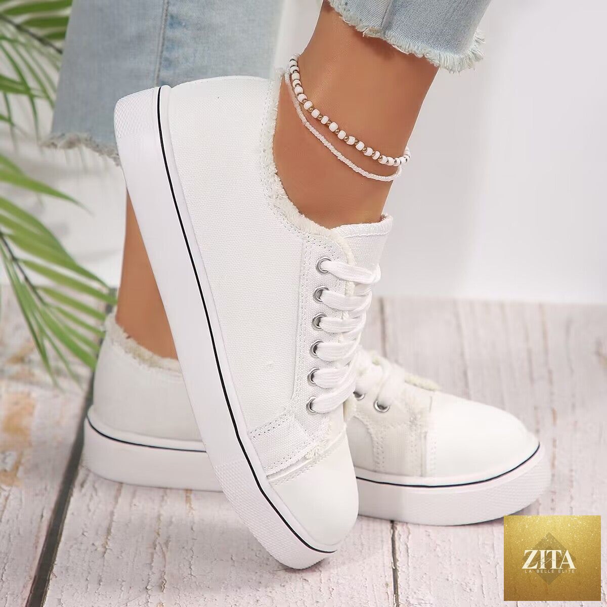 Women's lightweight canvas sneakers with lace-up design, flat low-top style from FitiqueFit, ideal for casual wear