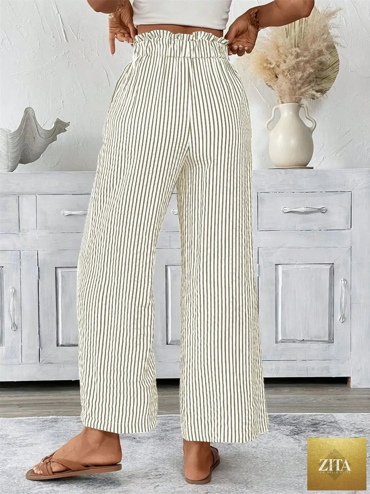 Plus size striped wide leg paper bag pants by SITRA, featuring a high waist and relaxed fit, shown in a full-length view.