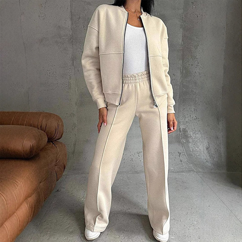 Women’s FitiqueFit 2-piece zip-up sweatsuit set with jacket and wide-leg sweatpants, casualwear perfect for relaxed comfort.